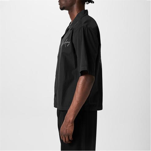 GOOD AMERICAN - Good Boy Twisted Split Hem Jeans