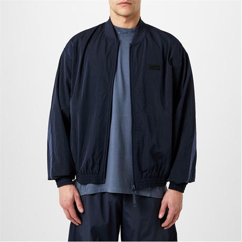 REEBOK - Pannelled Crinkle Track Jacket